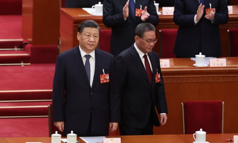 Xi Jinping, left, and China’s incoming premier, Li Qiang, at the National People's Congress meeting on Saturday in Beijing