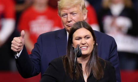 Sarah Sanders joins Donald Trump at a rally in Des Moines, Iowa in January.