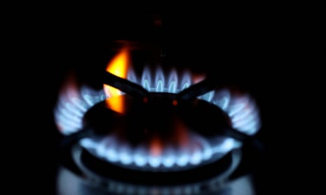 the lit blue flame of a cooker gas ring