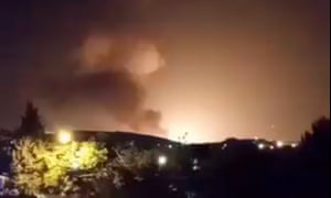 A blast illuminates the sky over Tehran, Iran, on Thursday night. It is believed to have happened near the Parchin military site east of the capital.