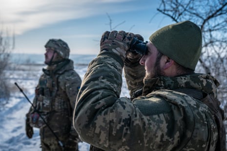 Ukrainian soldiers scan the skies for for a Russian drone at the Bakhmut frontline. Drone and airstrikes have become increasingly important as the war enters into a stalemate with both sides heavily fortified.