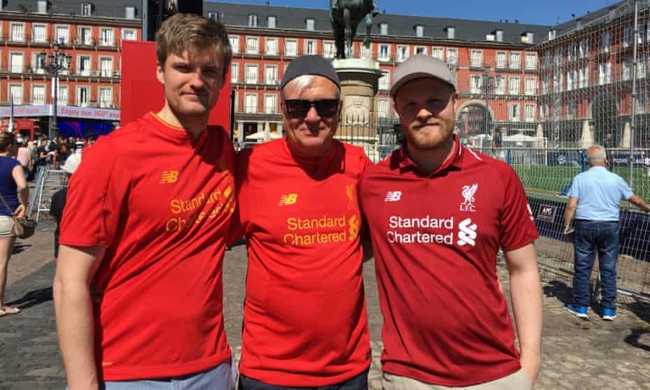 Liverpool supporters Jan Klepaker, from Norway, with his sons Kristian and Peder in Madrid’s Plaza Mayor.