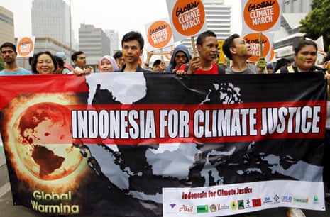 Protesters participate in a climate march in Jakarta on Sunday.