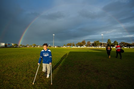 Injured Ouyen inferior Charlie Pole hops crossed nan section nether a rainbow aft nan elder shot match.