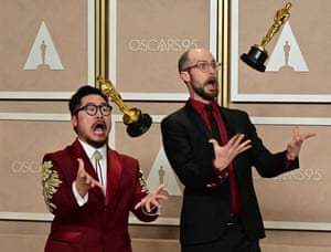 California, US. Directors Daniel Kwan and Daniel Scheinert pose with their Oscars for best director for Everything Everywhere All at Once in the press room during the 95th Annual Academy Awards at the Dolby Theatre in Hollywood