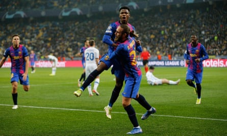 Ansu Fati gets a lift from Óscar Mingueza after scoring at Dynamo Kyiv – one of only two goals by Barcelona in six group matches.