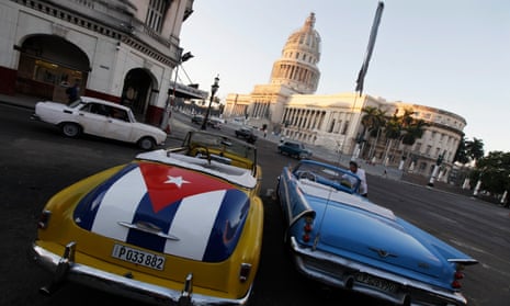 A car with a Cuban flag near the Capitol in Havana. The president is widely expected to follow a harder line against Havana.