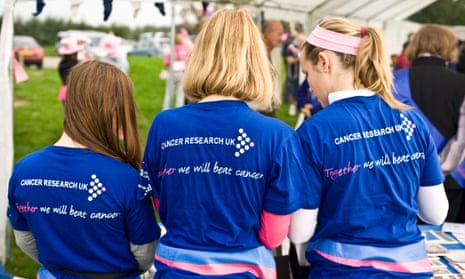 Young volunteers working for Cancer Research UK charity.