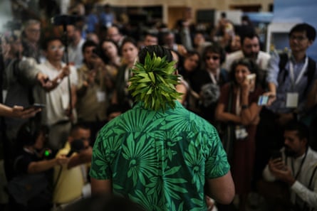 Joseph Sikulu, an activist from Tuvalu, talks reporters.