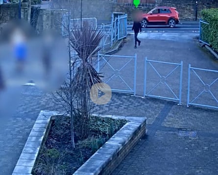 CCTV image showing Harvey approaching the school gates