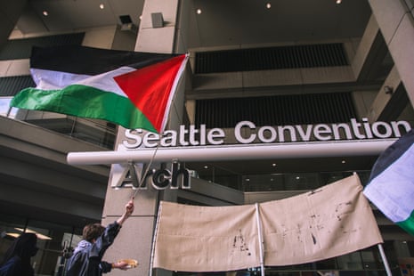 A protester waves a Palestinian flag