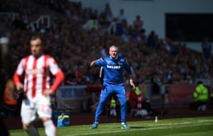 A frustrated-looking Paul Lambert shouts instructions from the touchline.