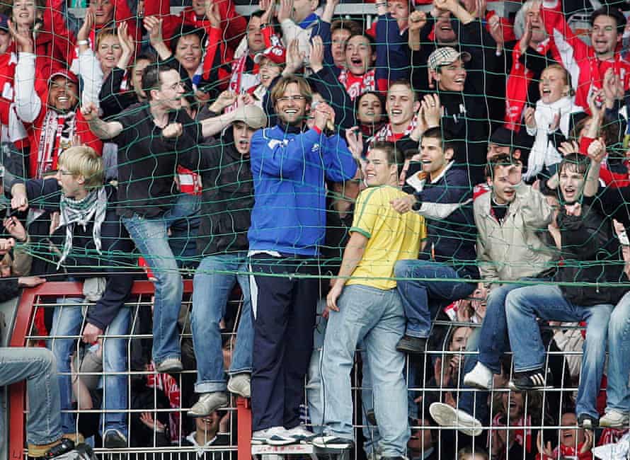 Jürgen Klopp joins the Mainz fans after keeping the club in the Bundesliga in 2005.