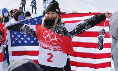 Chloe Kim celebrates her snowboard halfpipe gold
