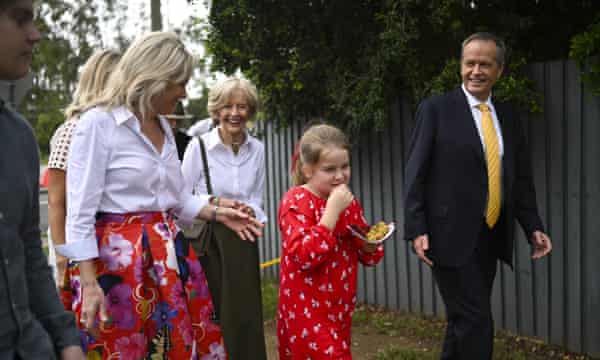 Bill Shorten and his family walk home after attending the Easter service at St Andrew’s Anglican Church in Brisbane