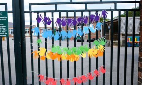 Hand artwork on a school gate in Sheffield