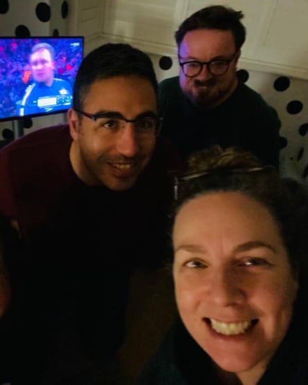 Omar Soliman, 40, (centre left) watches the final with his partner Kay Morrissey (front right) and friend Mark Collins