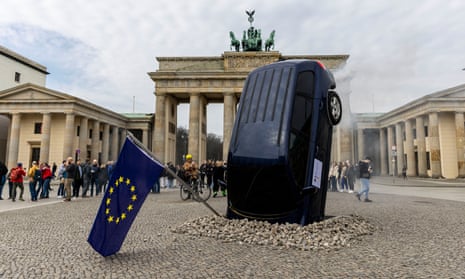 Greenpeace activists created an installation at the Brandenburg Gate in Berlin to protest against the German government’s request for vehicles that can be powered by e-fuels to be exempted from the phase-out.
