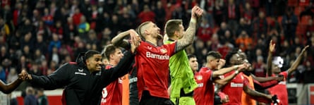 Leverkusen's players celebrate their victory.