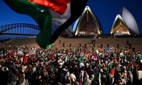 Pro-Palestine protesters on Monday night marched to the Sydney Opera House, which was lit up in white and blue in solidarity with Israel.