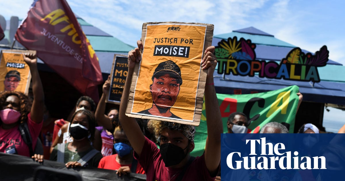 Anti-racism protesters march in Brazil after refugee murdered in Rio