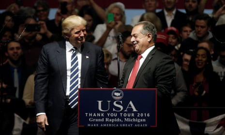 Donald Trump greets Andrew N Liveris, chairman and CEO of Dow Chemical, at a rally in Grand Rapids, Michigan, in December 2016.