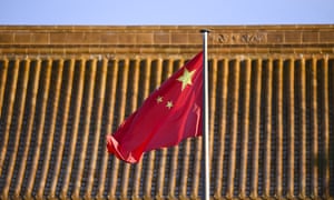 The Chinese flag is seen at the Chinese Embassy in Canberra.