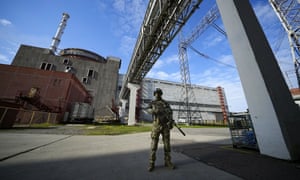 A Russian serviceman guards in an area of the Zaporizhzhia Nuclear Power Station in territory under Russian military control, southeastern Ukraine.