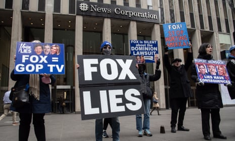 People protest outside the Fox News headquarters in New York City in February. 