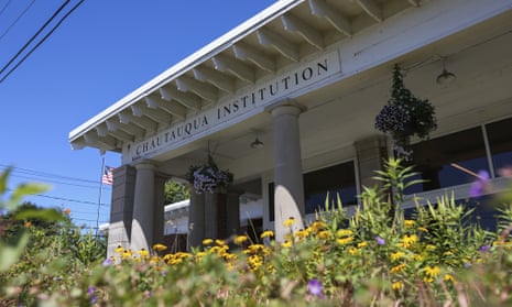 Flowers bloom outside the Chautauqua Institution welcome center on Friday.