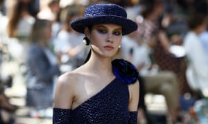 Girl with a pearl earring: a model in signature Coco chic.