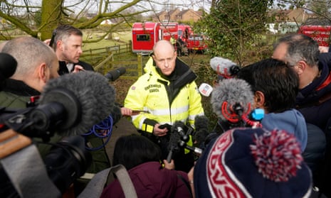 Peter Faulding (C) speaking to the media in St Michael's on Wyre, Lancashire, on 6 February as police continued to search for Nicola Bulley.