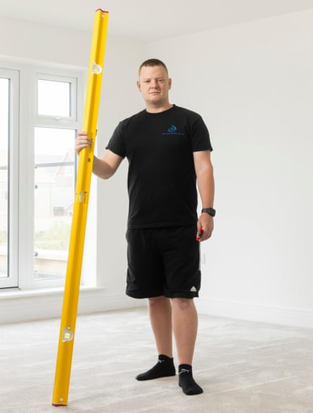 Orlando Murphy at work as part of professional snagging company New Home Quality Control, checking new-build houses for faults