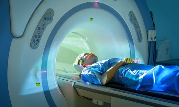 Patient entering Magnetic Resonance Imaging (MRI) scanner