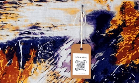 Multicoloured tie-dyed fabric with a QR code on a tag