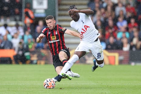 Yves Bissouma of Tottenham Hotspur is challenged by Ryan Christie of Bournemouth.