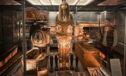 Egyptian coffin on display in glass cabinet at The Fitzwilliam Museum, Cambridge. UK.