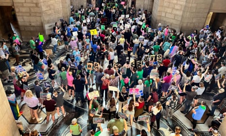 Hundreds of people descend on the Nebraska capitol, in Lincoln, on Tuesday to protest against plans the bill targeting abortions, and gender-affirming care for minors.