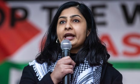 A woman speaks at a political rally