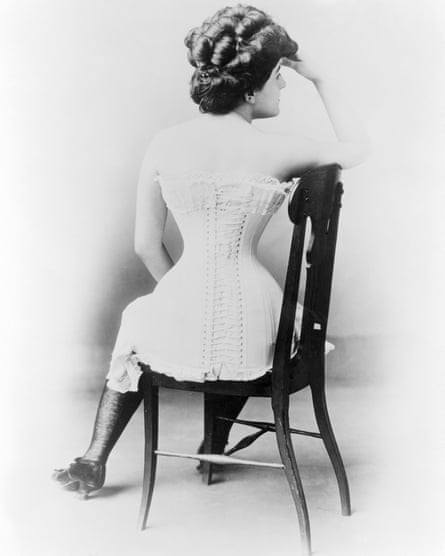 A woman in a Victorian corset.