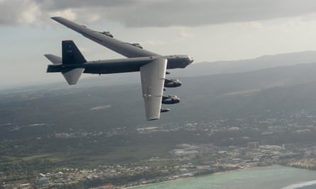 A US B-52H Stratofortress strategic bomber flies off the coast of Guam.