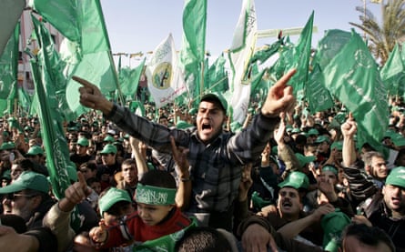 Palestinian Hamas supporters shout anti-Israel slogans during a rally in Gaza, January 2006.