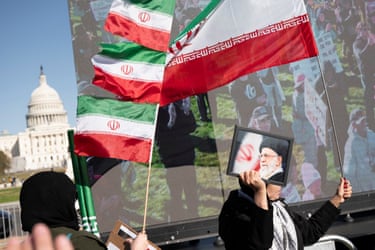 Washington DC, USSupporters of the Iranian regime hold flags and images of the late Ayatollah Ali Khamenei near the US Capitol