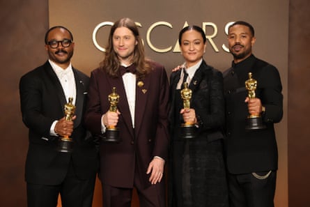 From left, Michael B Jordan, Autumn Durald Arkapaw, Ludwig Göransson and Ryan Coogler with their Oscars for Sinners.