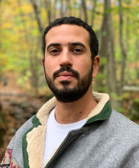 person poses for a photograph