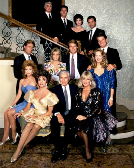 Michael Nader, back row, right, with the cast of Dynasty in 1981; the show’s sensational storylines helped it overtake the rival soap Dallas in the ratings.