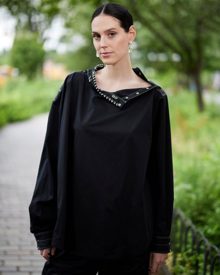 Victor wearing a black top.