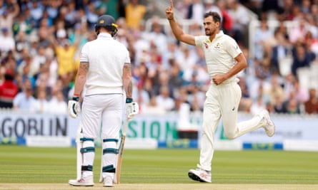 Mitchell Starc celebrates after dismissing Ben Stokes in the first over of the day