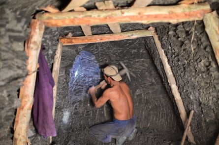a man working in a mine shaft