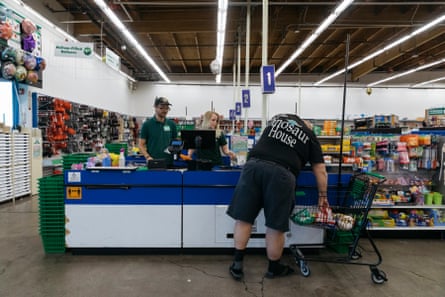 a man purchases toys at a dollar tree
